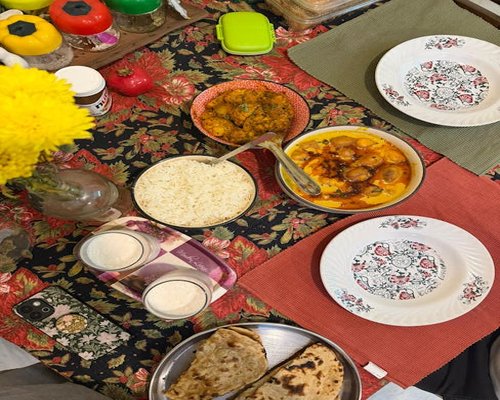 A traditional homemade meal with balanced portions arranged neatly on a dining table